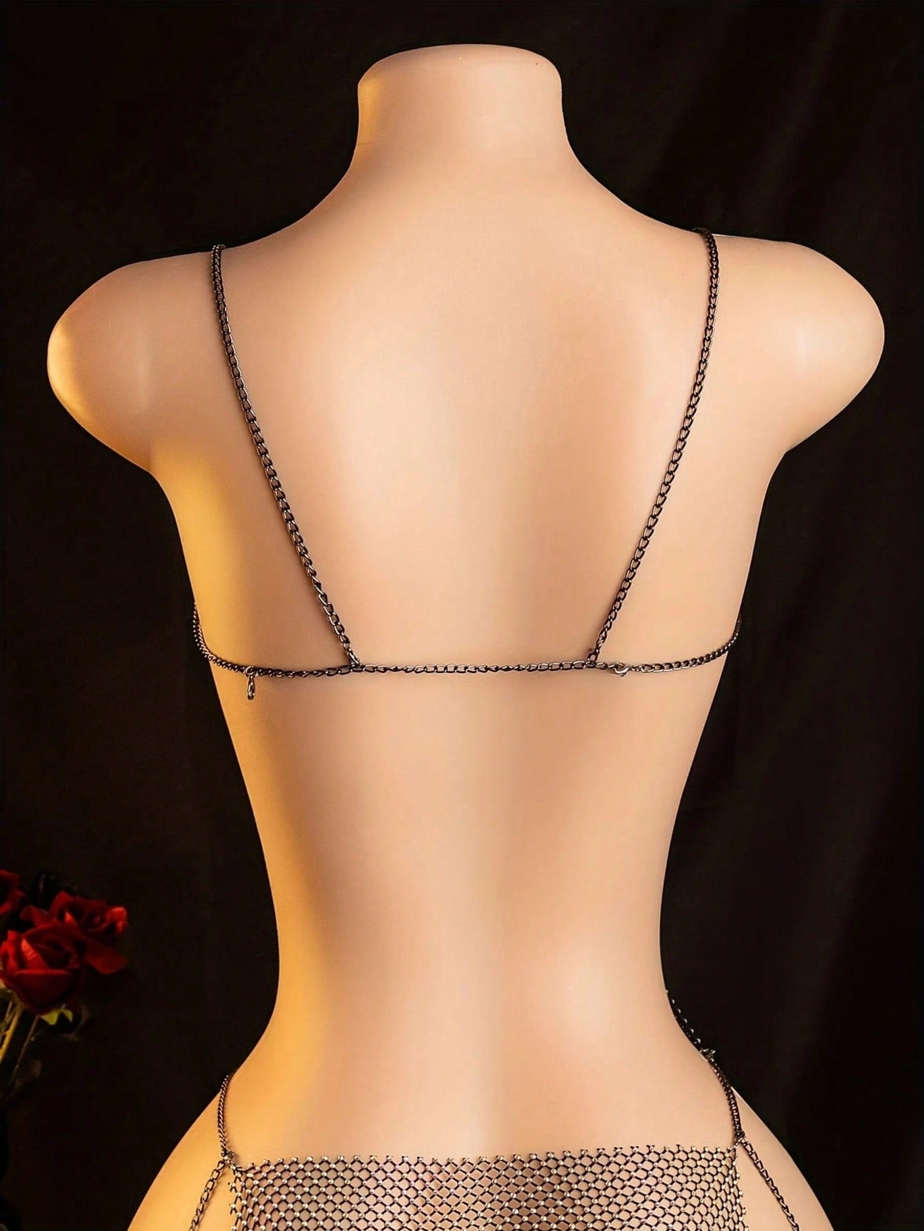 Sheer women's babydoll lingerie slip dress with rhinestone detail, spaghetti straps, and crossback design in polyester elastane fabric.