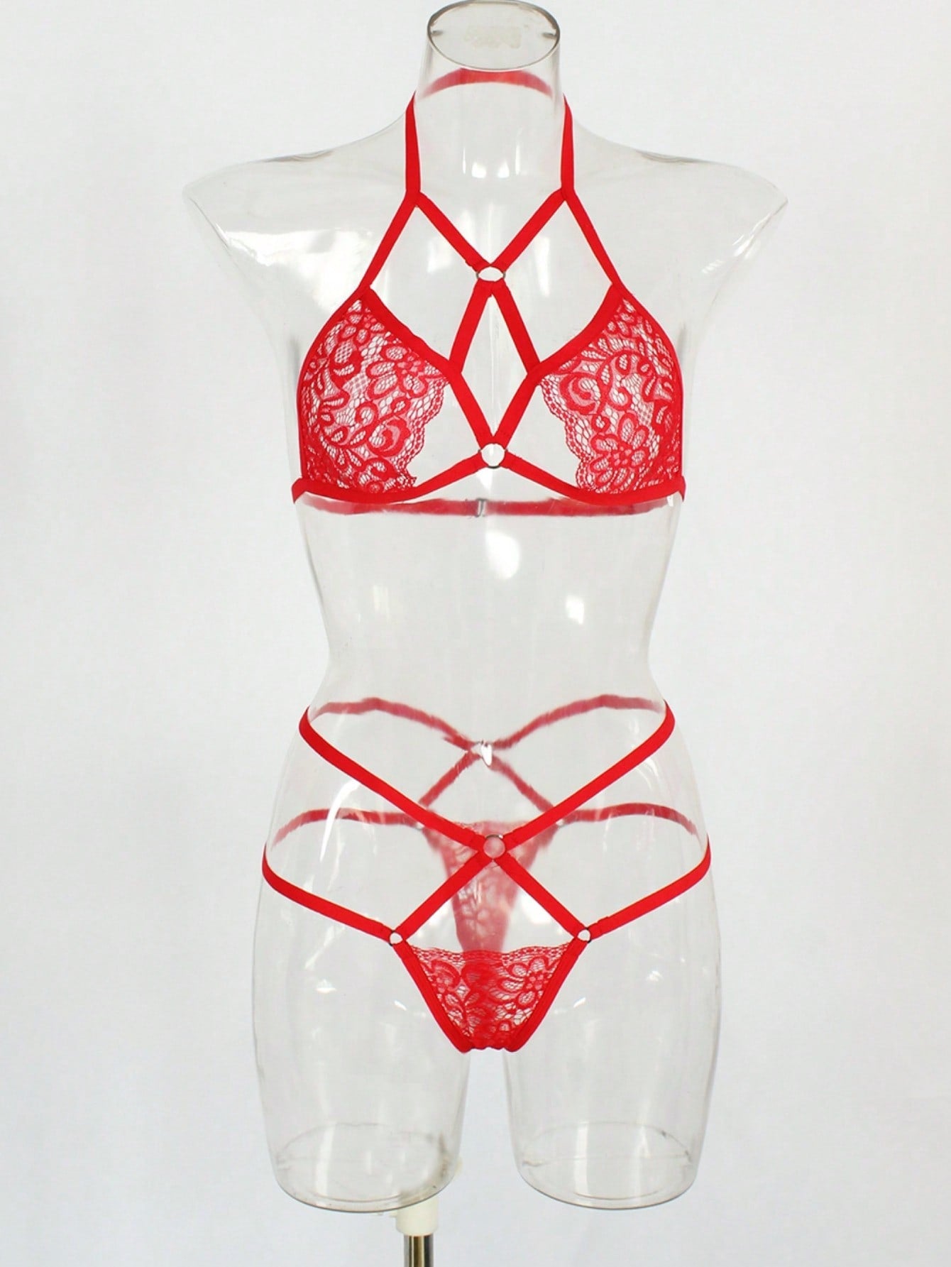 Women's two-piece lingerie set with contrast lace and mesh, featuring a wireless bralette with adjustable spaghetti straps and a low-rise thong.