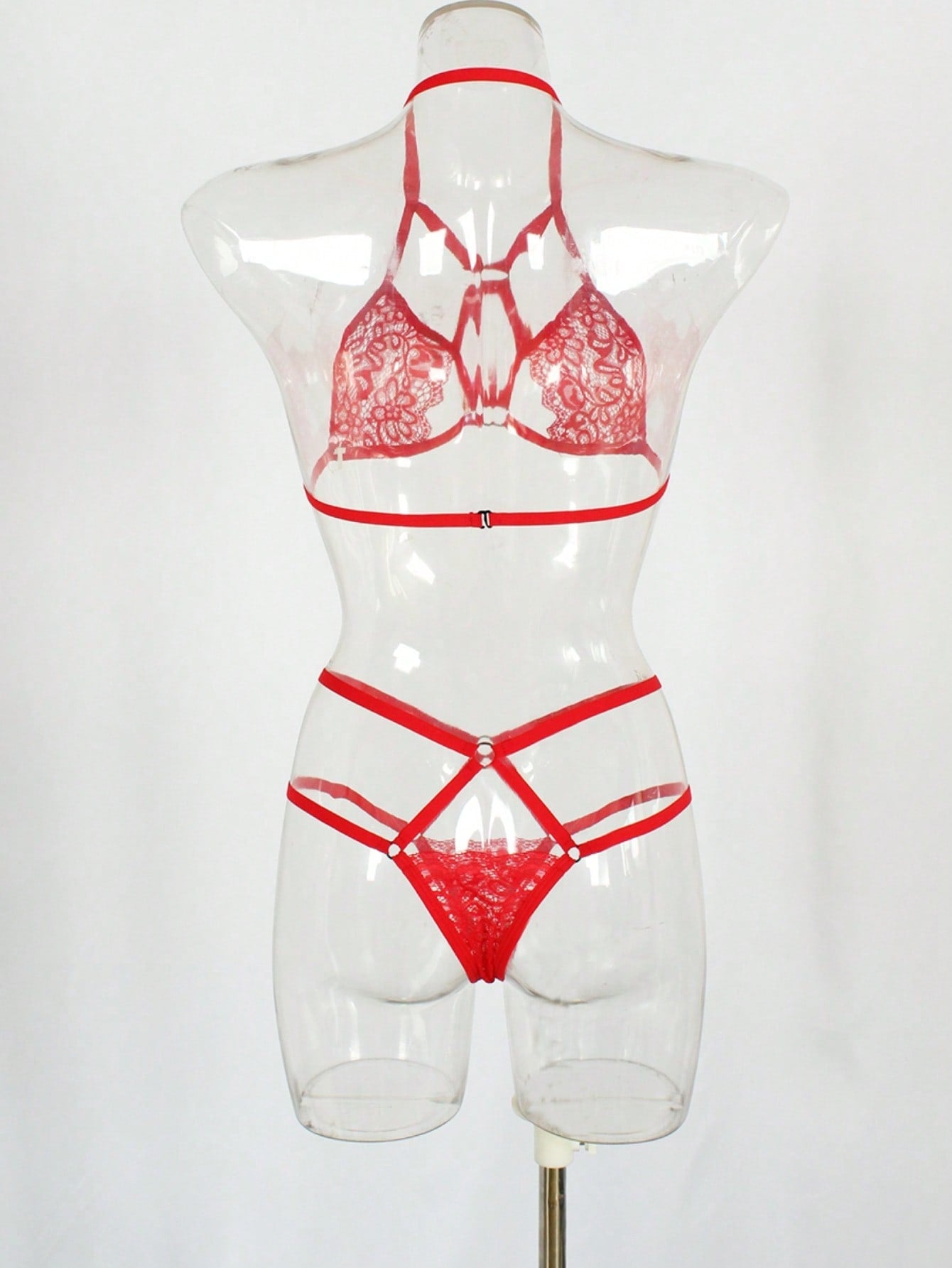 Women's two-piece lingerie set with contrast lace and mesh, featuring a wireless bralette with adjustable spaghetti straps and a low-rise thong.