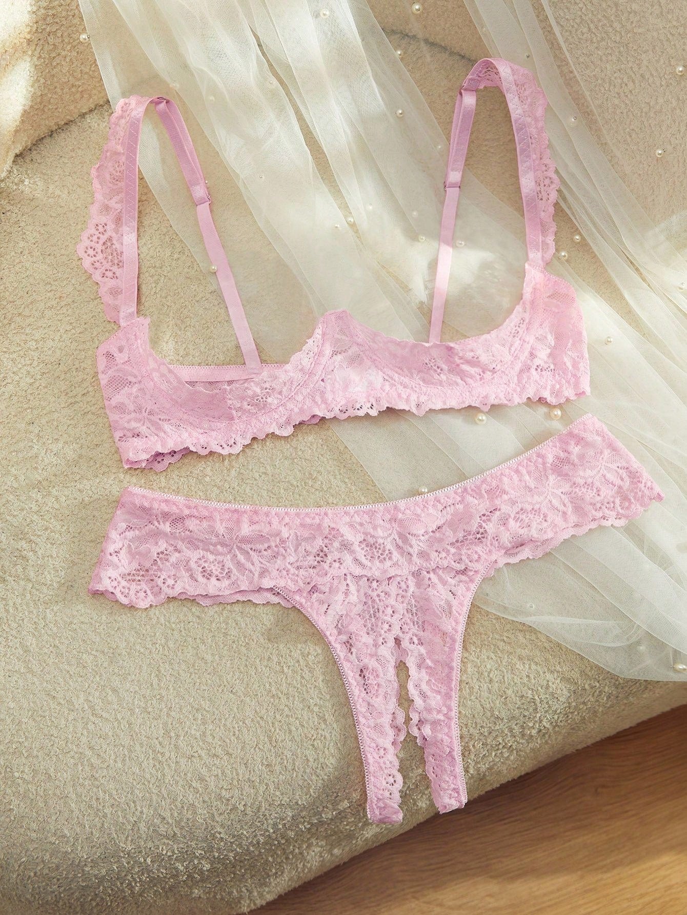 Women's sheer lace underwire bra and thong set with open cup bra, adjustable spaghetti straps, and matching low rise V-string thong in a 2-piece lingerie set.