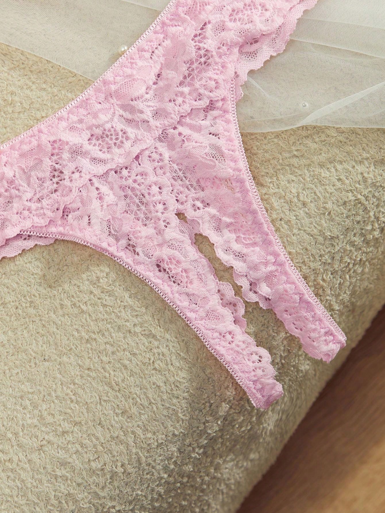Women's sheer lace underwire bra and thong set with open cup bra, adjustable spaghetti straps, and matching low rise V-string thong in a 2-piece lingerie set.
