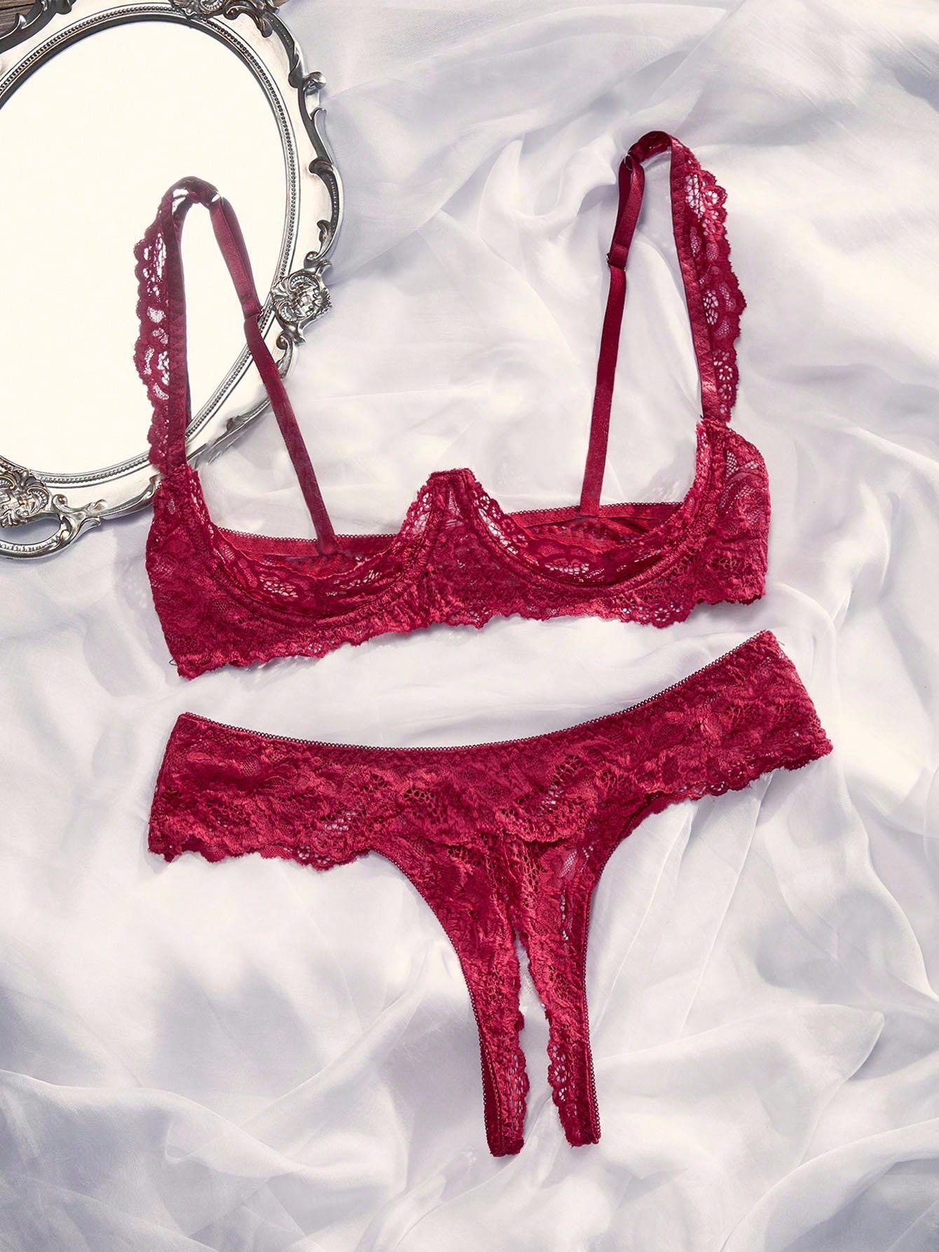 Women's sheer lace underwire bra and thong set with open cup bra, adjustable spaghetti straps, and matching low rise V-string thong in a 2-piece lingerie set.