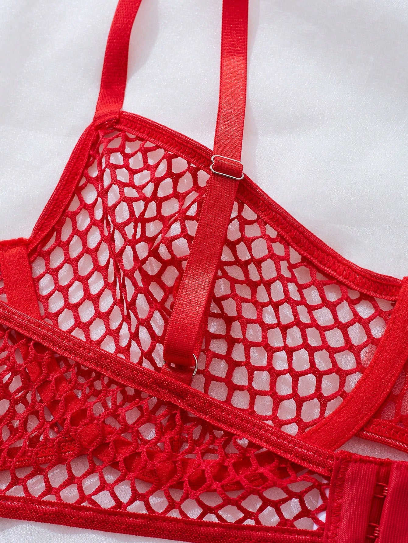 Women's 2-piece mesh lingerie set with hollow out detail, underwire bra, adjustable spaghetti straps, and matching low-rise thong panties in a sheer plain design.