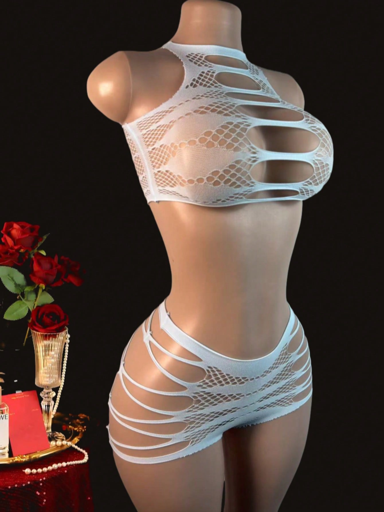Women's 2-piece lace jumpsuit lingerie set with wireless full cup design, sleeveless crop styling, semi-sheer look, and high-stretch knitted fabric.