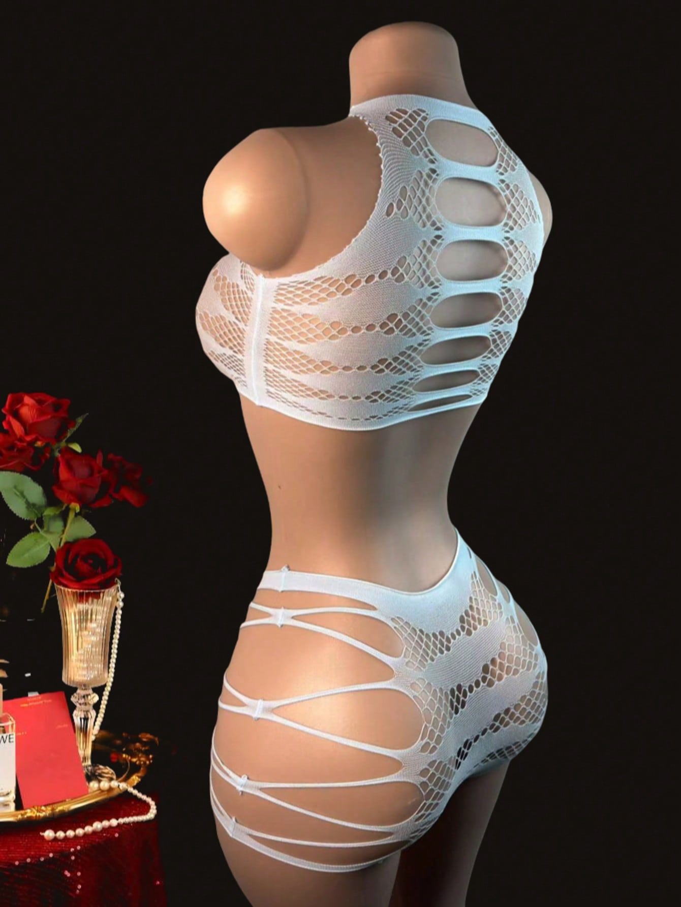 Women's 2-piece lace jumpsuit lingerie set with wireless full cup design, sleeveless crop styling, semi-sheer look, and high-stretch knitted fabric.
