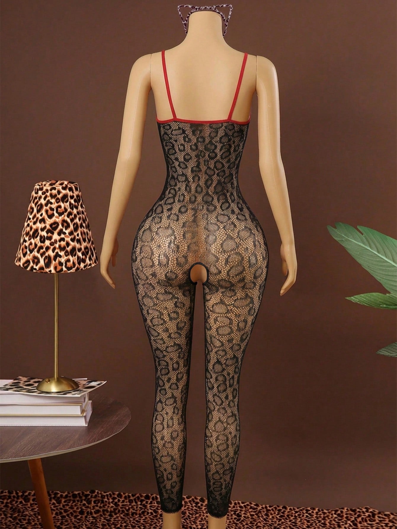 Sleeveless pink lingerie bodysuit 2 piece set with sheer textured fabric, backless design, contrast lace, knot detail, adjustable spaghetti straps, and cropped low rise fit.
