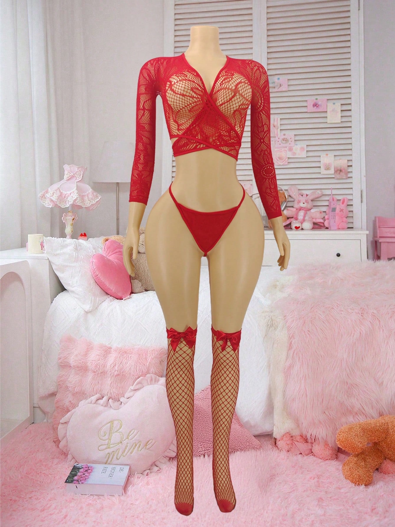 Women's Christmas lingerie set in red with sheer mesh bodysuit, backless design, deep V neckline, adjustable straps, and matching stockings.