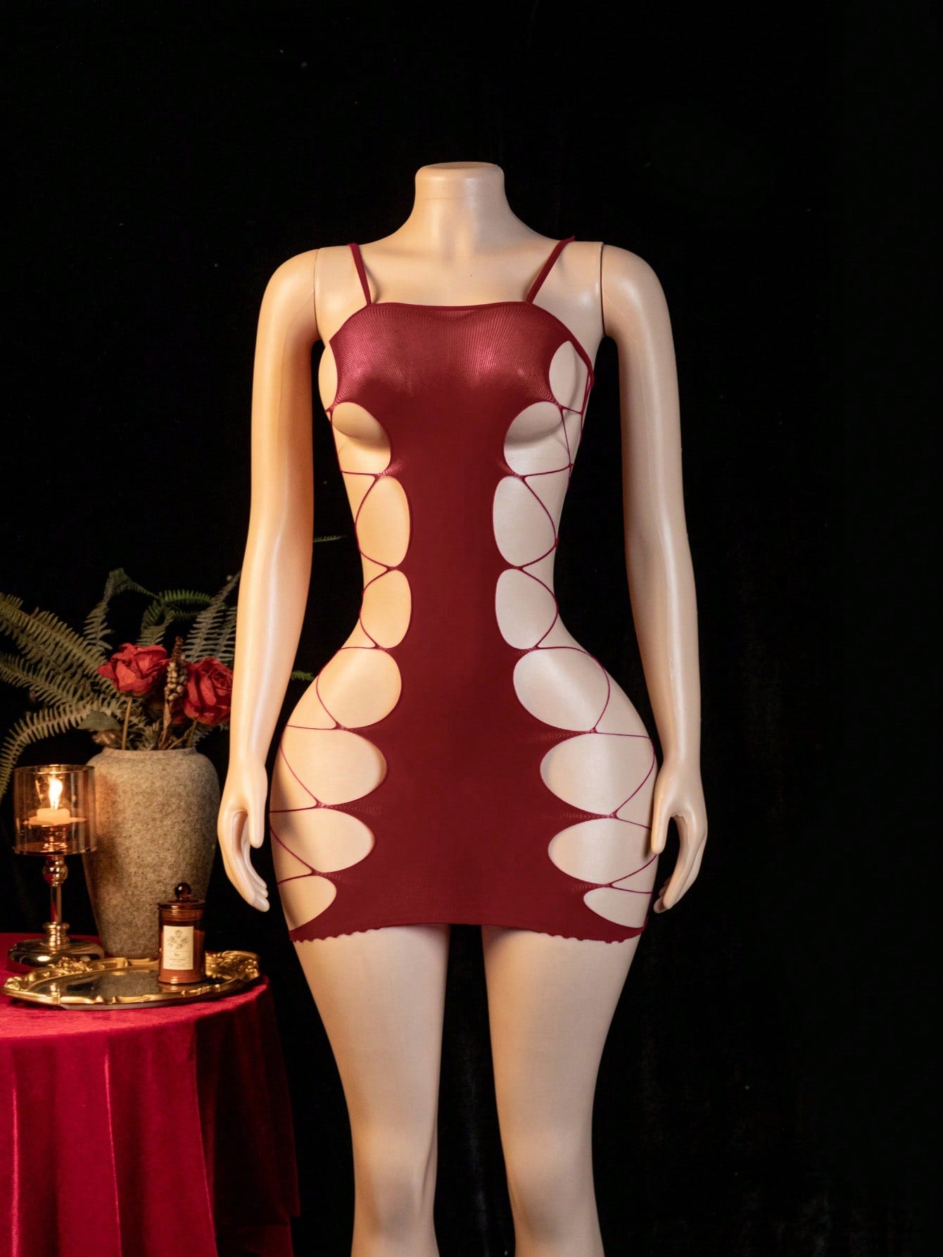 Women's sheer mesh babydoll lingerie dress with cut-out detail, adjustable spaghetti straps, mini length, and high-stretch fabric.