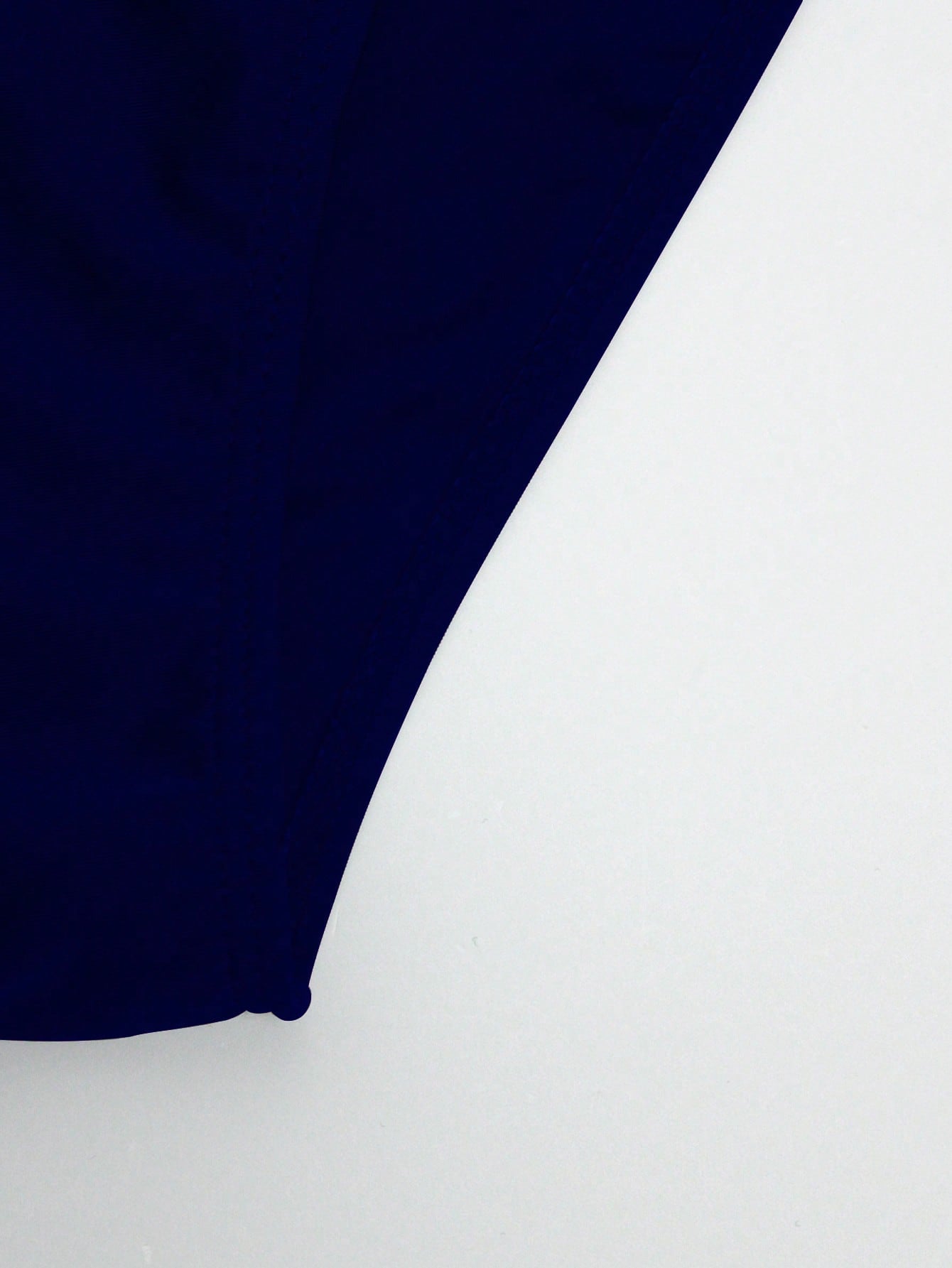 Men's solid swim briefs with O-ring detail, high waist, short racer cut, and high-stretch polyamide elastane fabric.