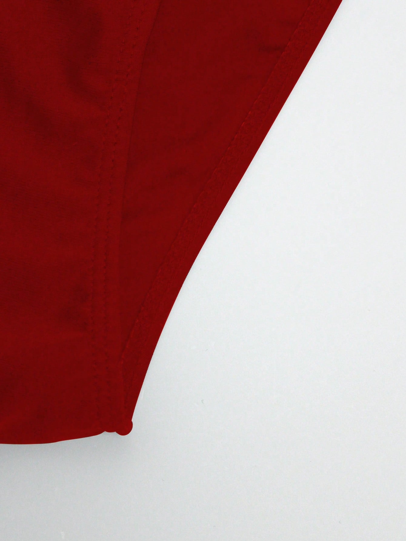 Men's solid swim briefs with O-ring detail, high waist, short racer cut, and high-stretch polyamide elastane fabric.