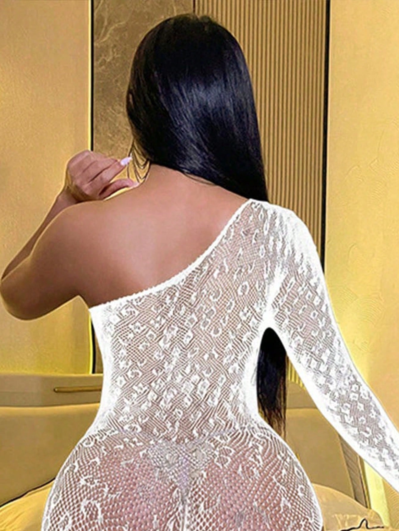 Women's sheer lace mesh bodysuit with leopard print, long sleeves, hollow out detail, and high-stretch fabric, designed for lingerie styling or as a swimsuit cover up.
