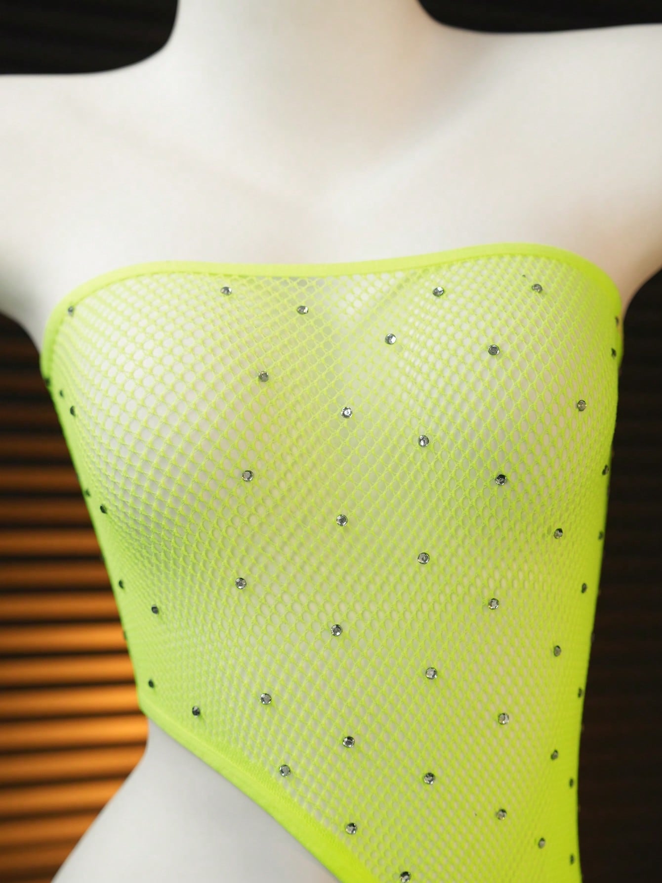 Women's 2-piece sheer lingerie set featuring an asymmetric strapless bodysuit with cut-out rhinestone details and a matching low-rise G-string thong.