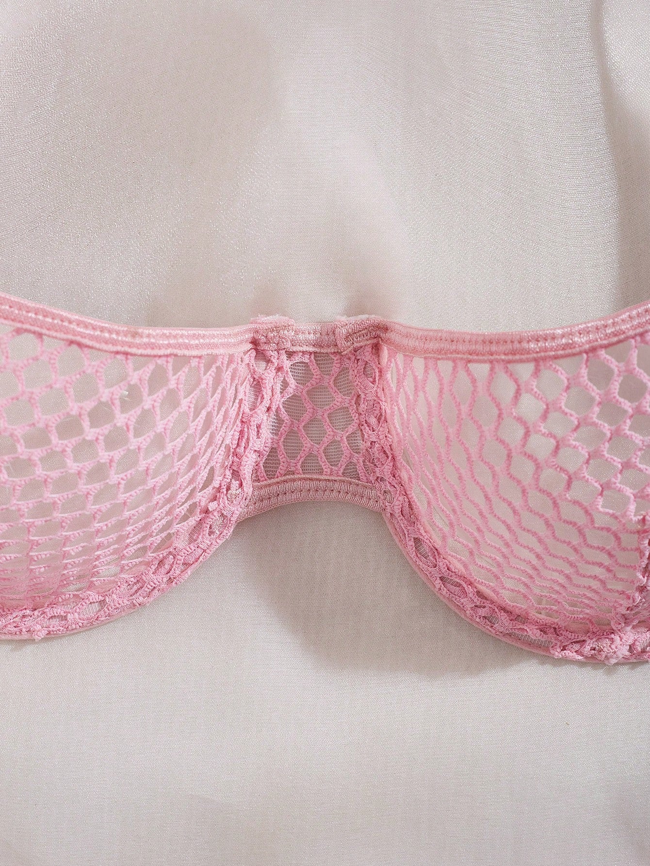 Women's 2-piece mesh lingerie set with hollow out detail, underwire bra, adjustable spaghetti straps, and matching low-rise thong panties in a sheer plain design.