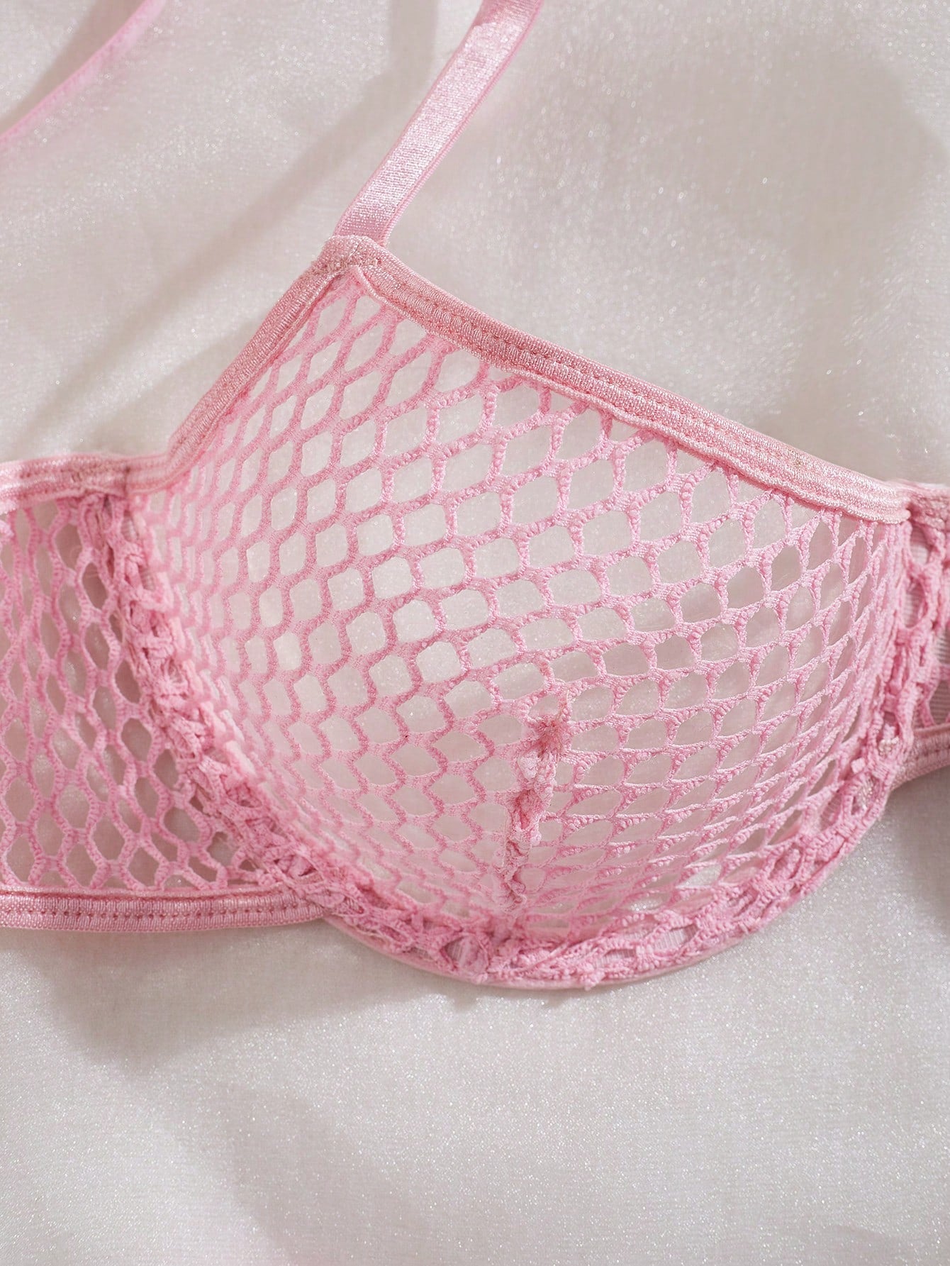 Women's 2-piece mesh lingerie set with hollow out detail, underwire bra, adjustable spaghetti straps, and matching low-rise thong panties in a sheer plain design.
