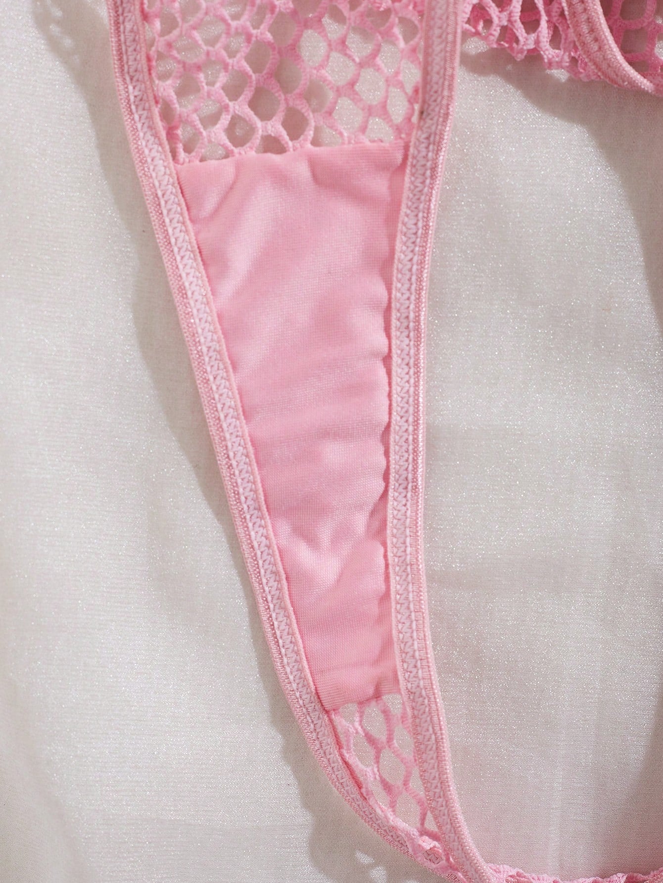 Women's 2-piece mesh lingerie set with hollow out detail, underwire bra, adjustable spaghetti straps, and matching low-rise thong panties in a sheer plain design.