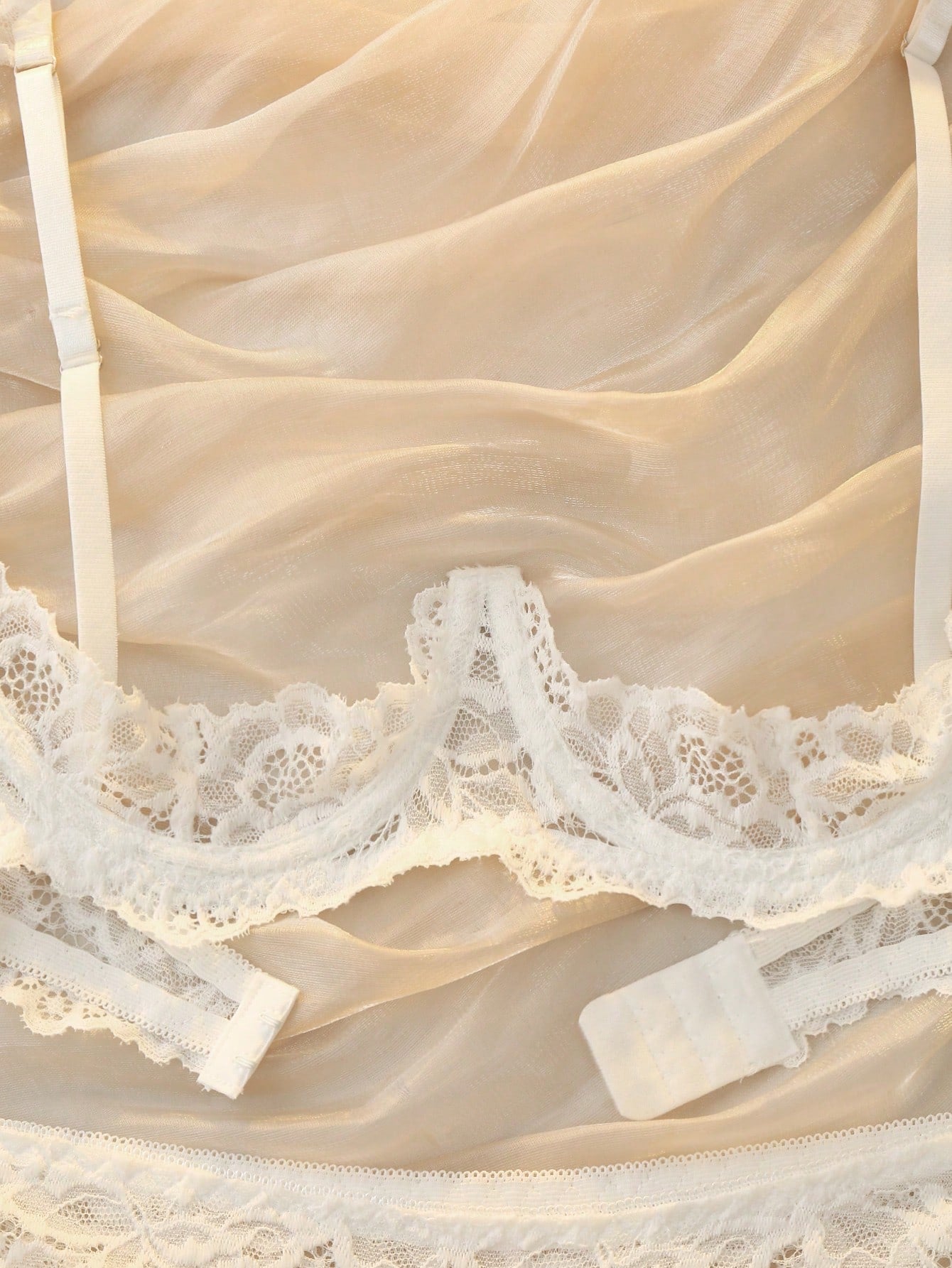 Women's sheer lace underwire bra and thong set with open cup bra, adjustable spaghetti straps, and matching low rise V-string thong in a 2-piece lingerie set.