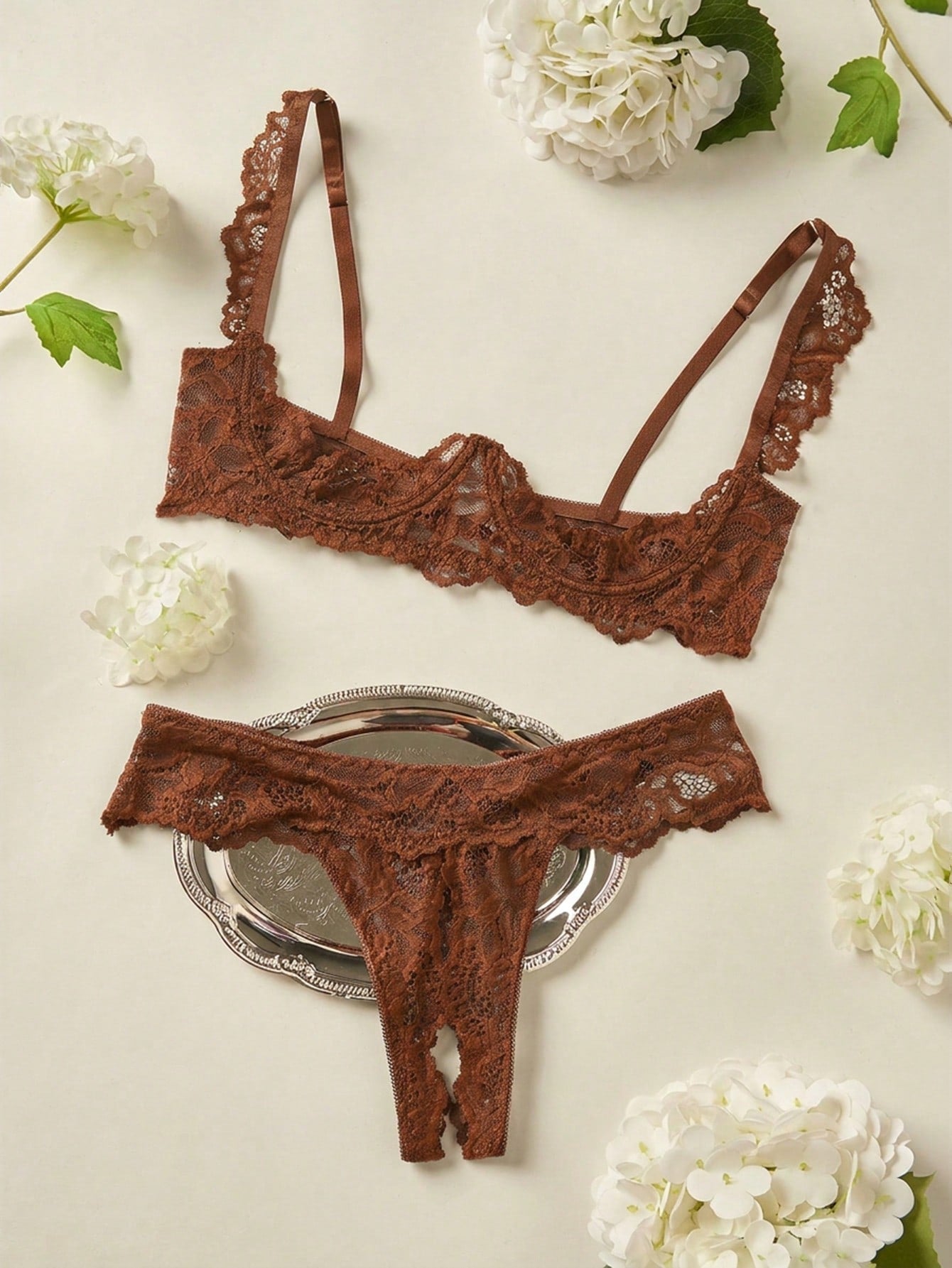 Women's sheer lace underwire bra and thong set with open cup bra, adjustable spaghetti straps, and matching low rise V-string thong in a 2-piece lingerie set.