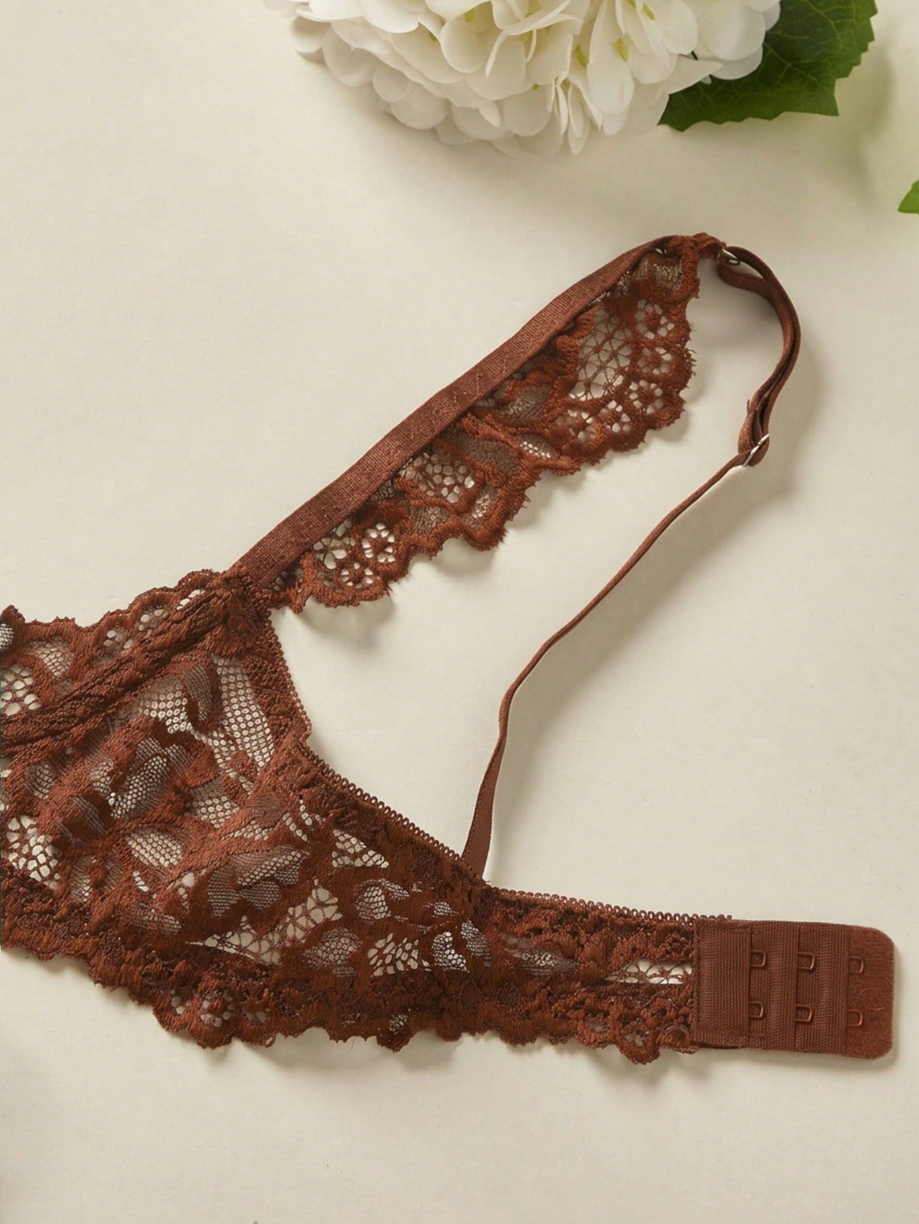 Women's sheer lace underwire bra and thong set with open cup bra, adjustable spaghetti straps, and matching low rise V-string thong in a 2-piece lingerie set.