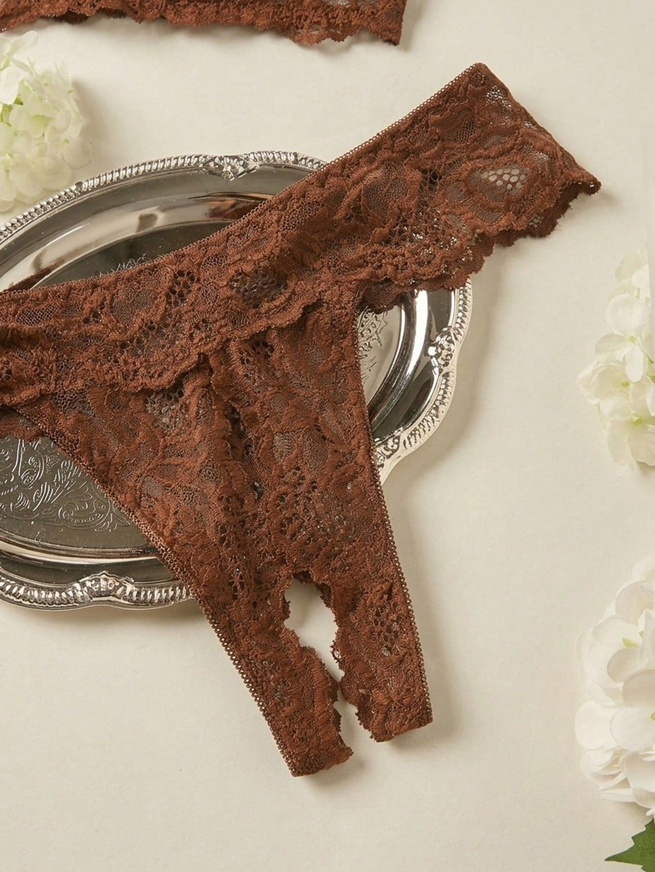Women's sheer lace underwire bra and thong set with open cup bra, adjustable spaghetti straps, and matching low rise V-string thong in a 2-piece lingerie set.