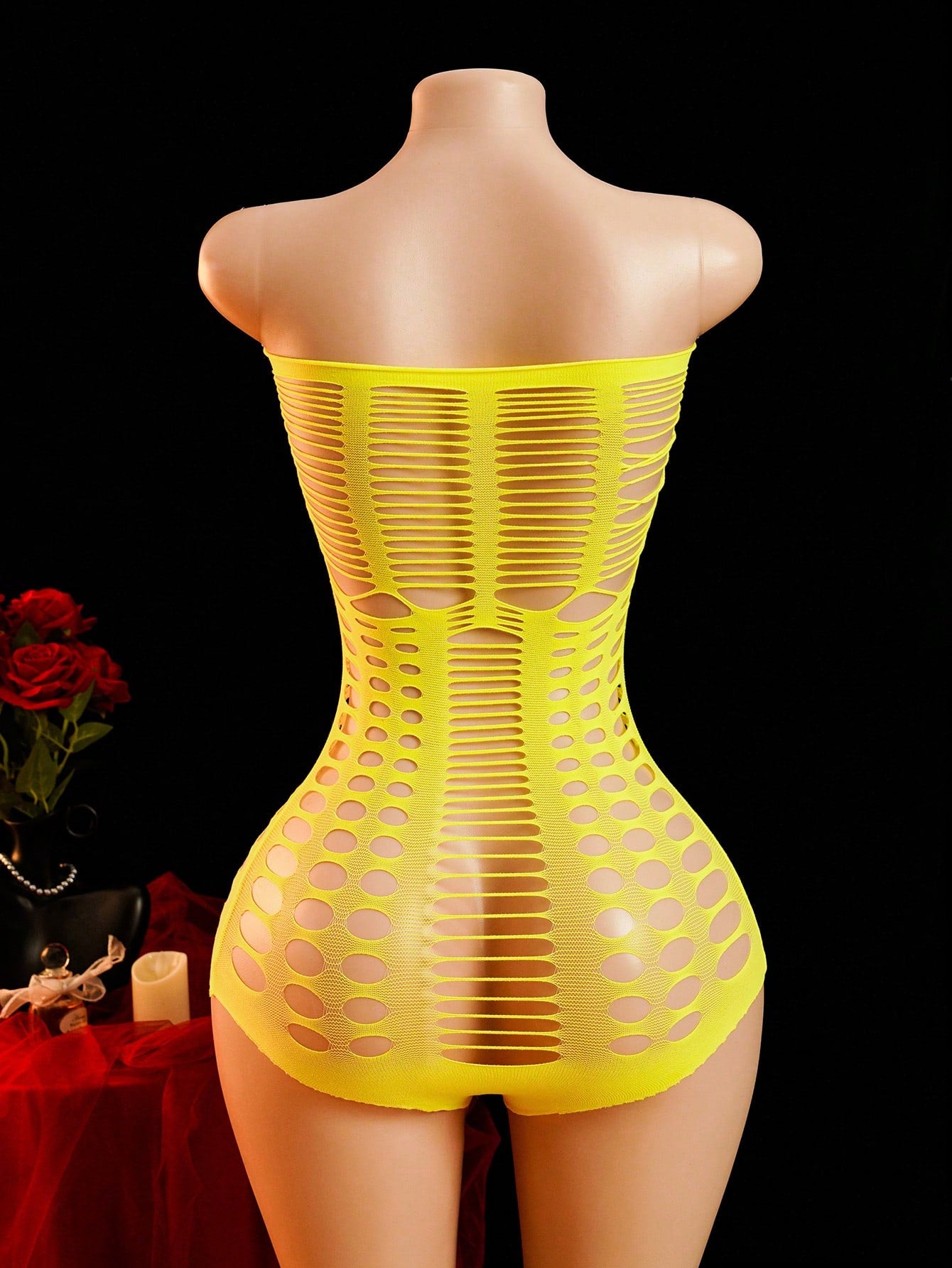Women's sheer mesh lingerie jumpsuit in yellow with a strapless bandeau neckline, sleeveless design, and high-stretch fabric.