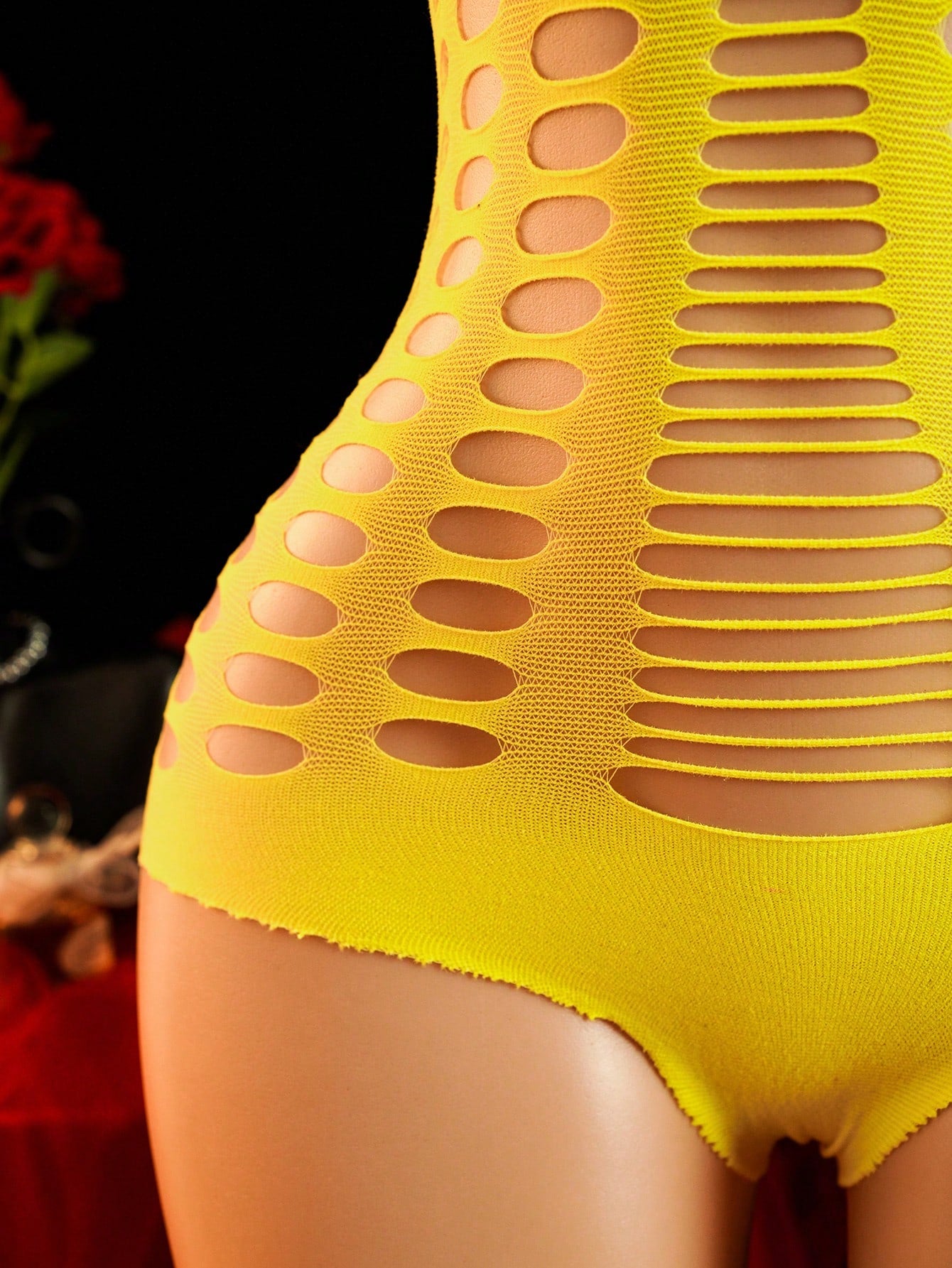 Women's sheer mesh lingerie jumpsuit in yellow with a strapless bandeau neckline, sleeveless design, and high-stretch fabric.