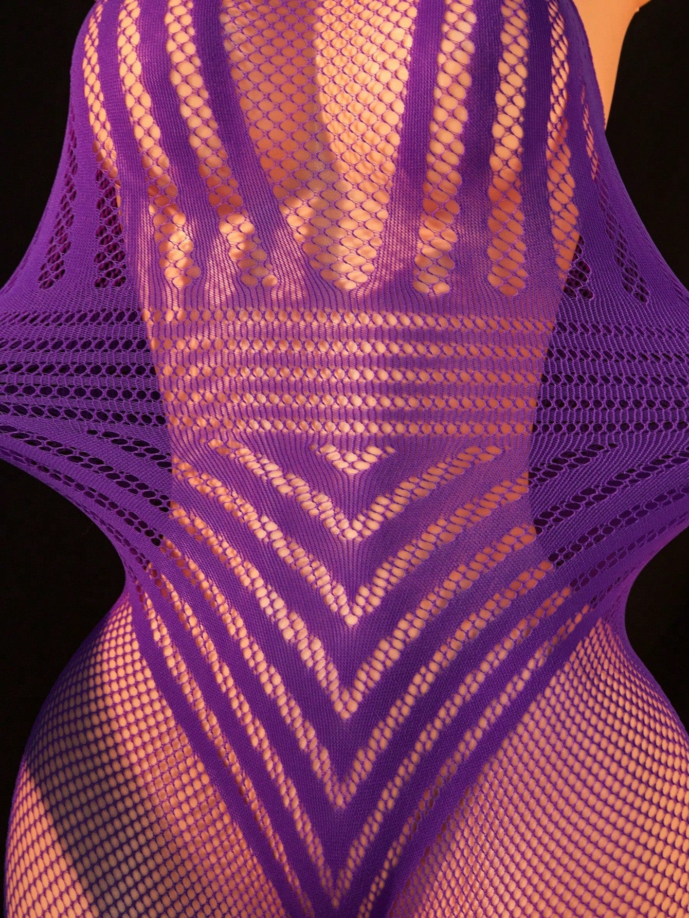 Women's fishnet bodystocking lingerie with halter neckline, backless hollow out detail, sleeveless design, and high-stretch fabric.