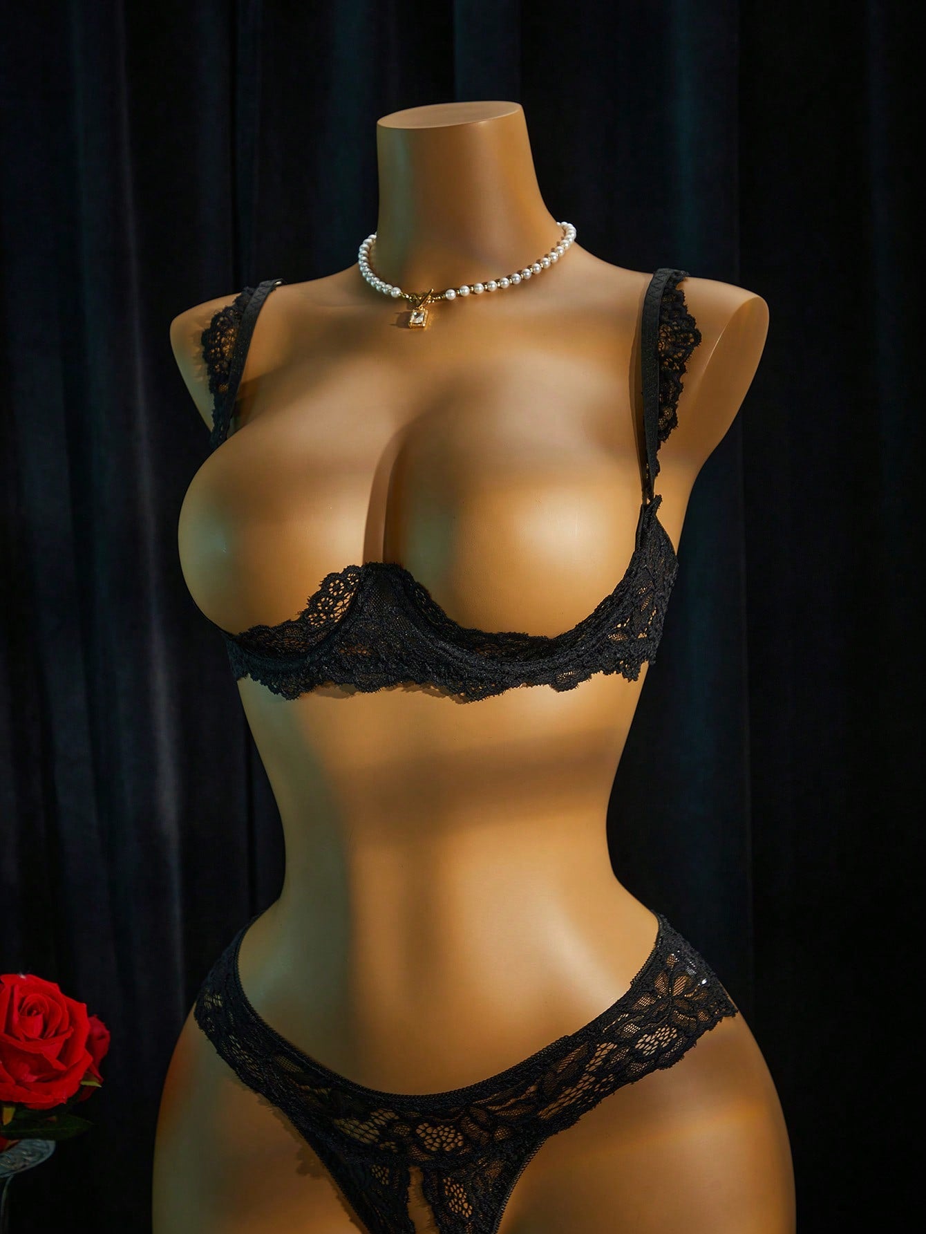 Women's sheer lace underwire bra and thong set with open cup bra, adjustable spaghetti straps, and matching low rise V-string thong in a 2-piece lingerie set.
