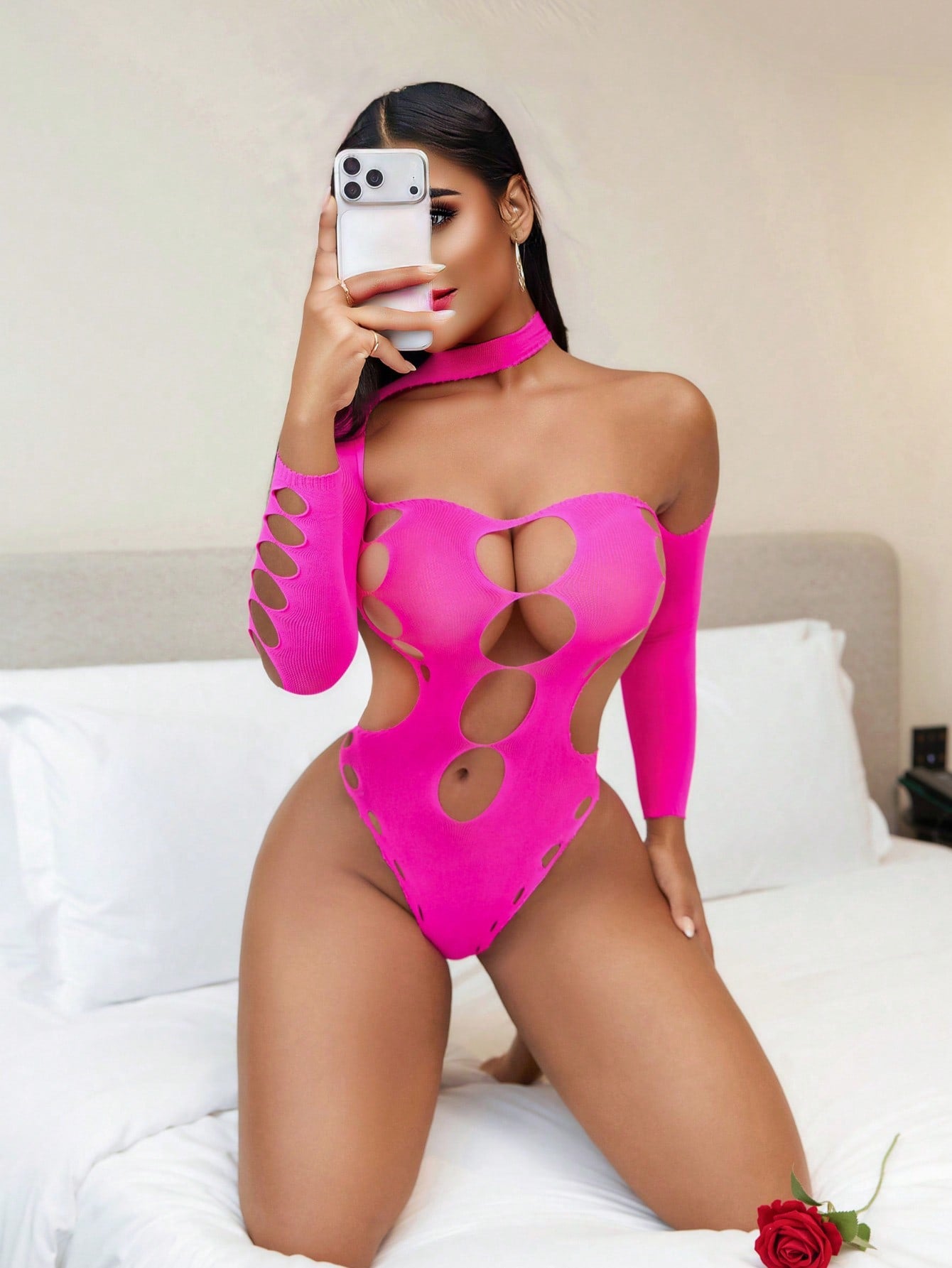Women's sheer mesh lingerie bodysuit with hollow out detail, strapless neckline, sleeveless design, wireless construction, and medium stretch fabric.