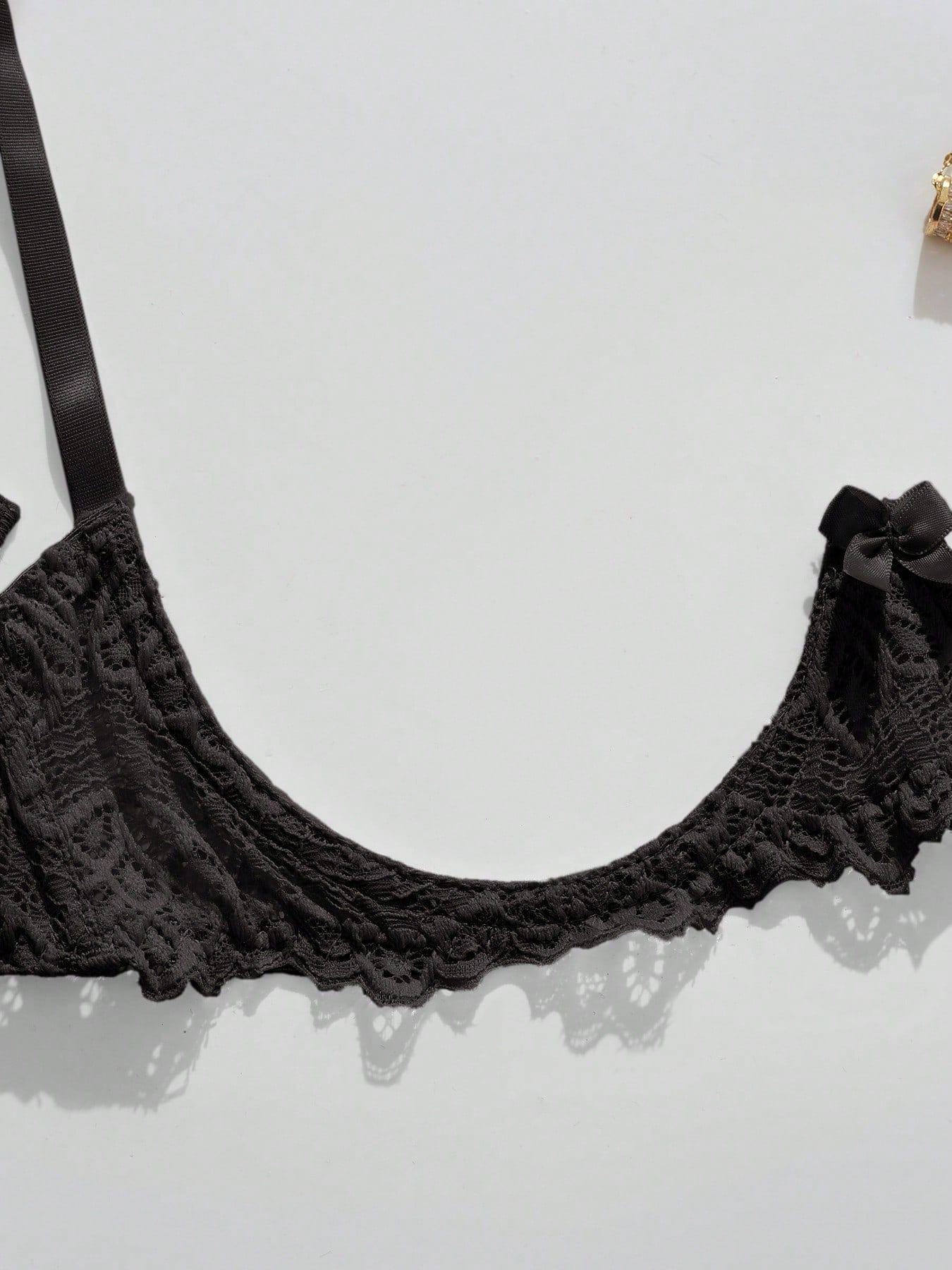 Women's lace bra and panty set with underwire bra, adjustable straps, 3/4 cup design, and matching thong panty in a sheer 2-piece lingerie style.