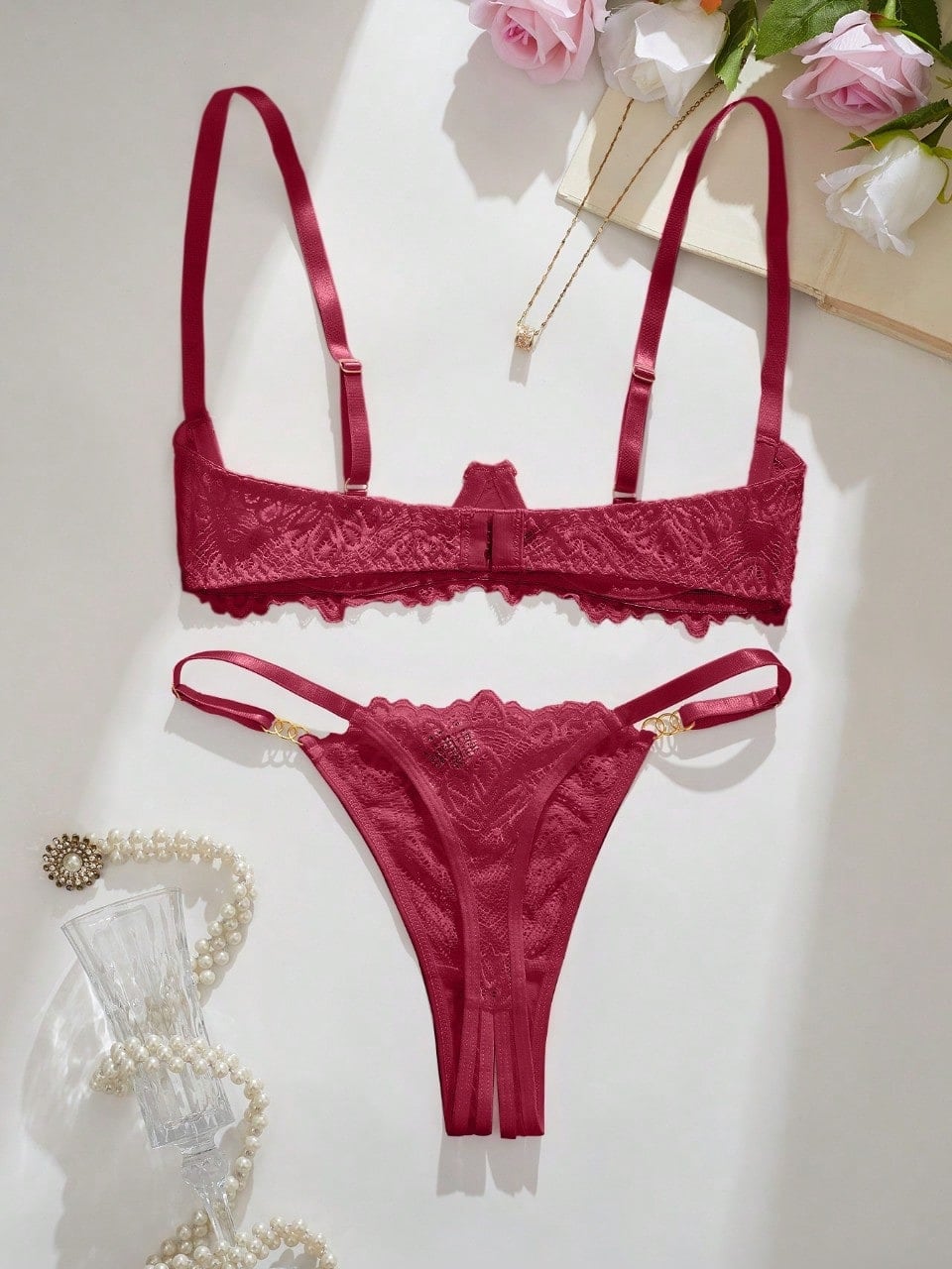 Women's lace bra and panty set with underwire bra, adjustable straps, 3/4 cup design, and matching thong panty in a sheer 2-piece lingerie style.