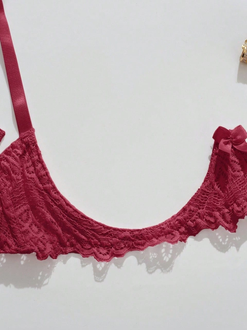 Women's lace bra and panty set with underwire bra, adjustable straps, 3/4 cup design, and matching thong panty in a sheer 2-piece lingerie style.
