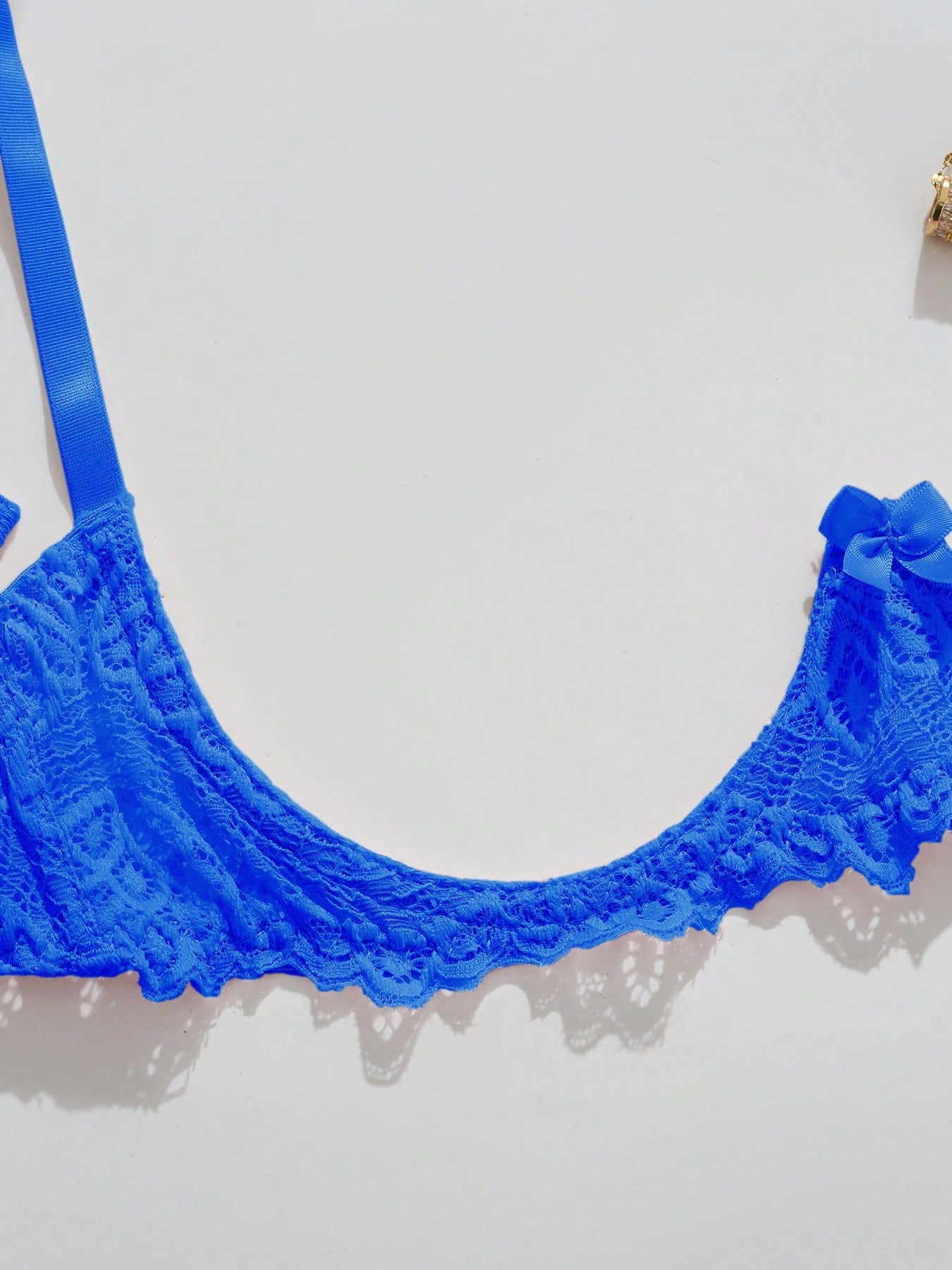 Women's lace bra and panty set with underwire bra, adjustable straps, 3/4 cup design, and matching thong panty in a sheer 2-piece lingerie style.