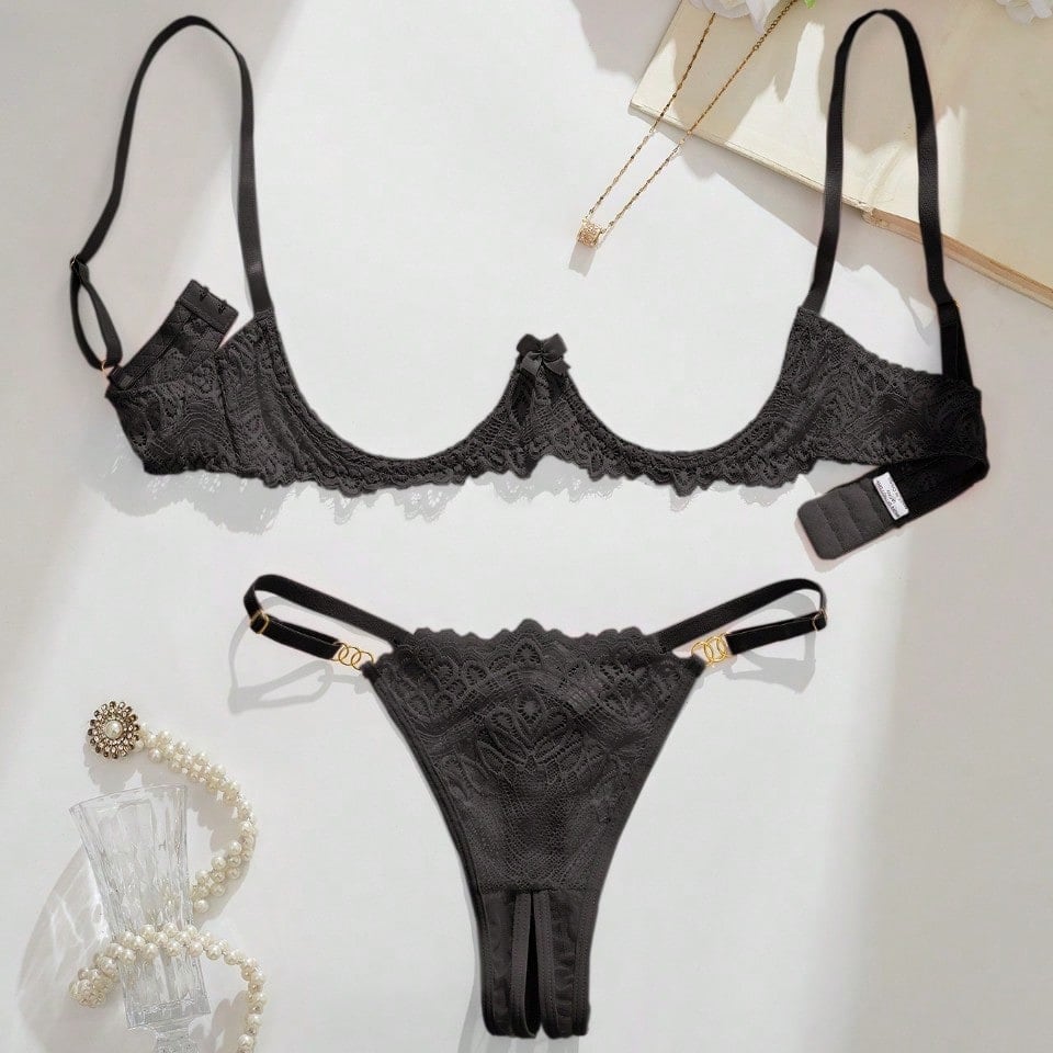 Women's lace bra and panty set with underwire bra, adjustable straps, 3/4 cup design, and matching thong panty in a sheer 2-piece lingerie style.